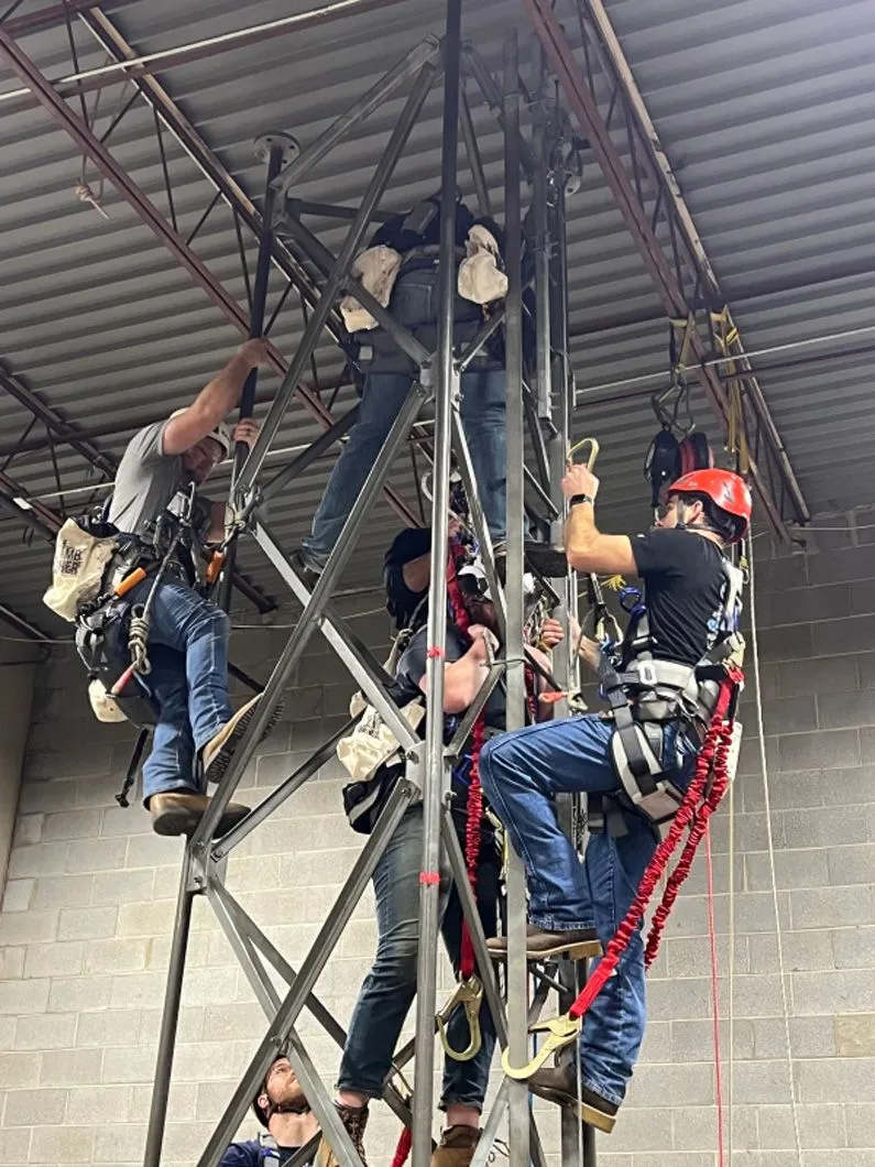 Telecom crew working on tower